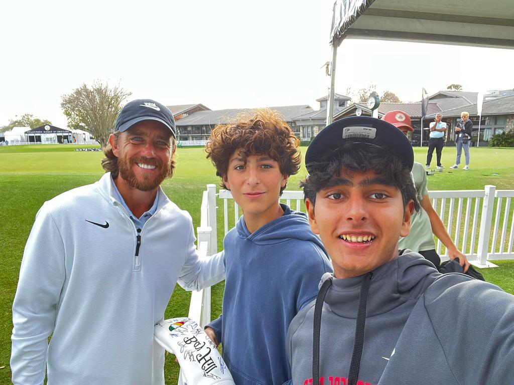 Kvahn with friends and pro golfer Tommy Fleetwood at a tournament